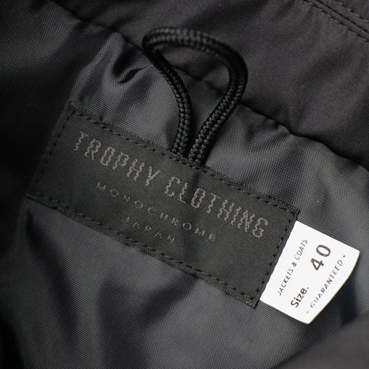 “MONOCHROME” Level 4 Wind Breaker / TR22AW-506